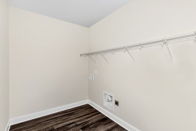 Laundry room corner with removable shelves