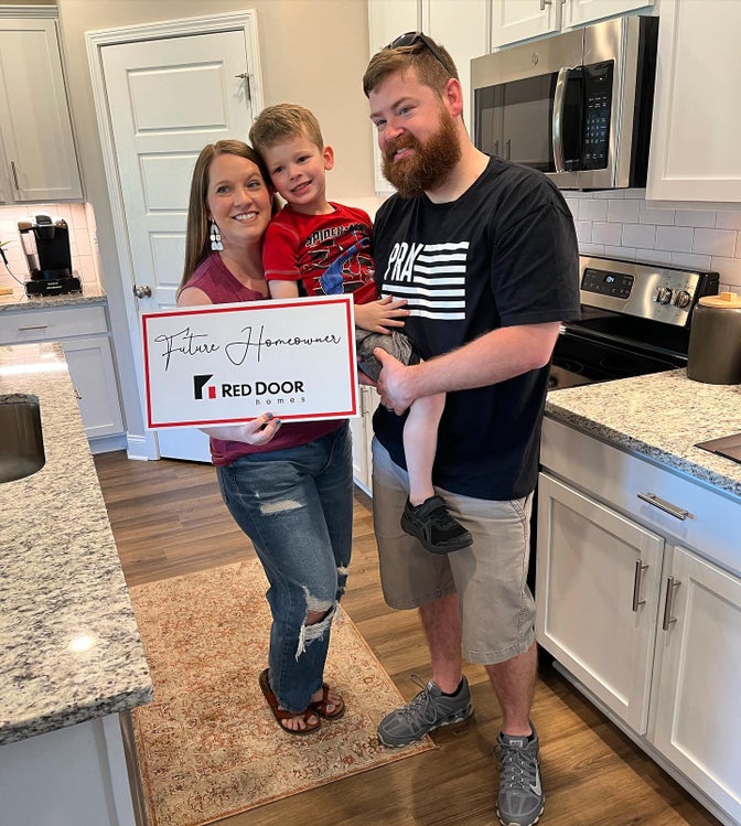 Red Door Homes - A happy family enjoying their new home